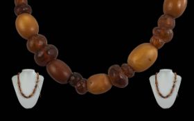 Early 20th Century Single Strand Butterscotch Amber Beaded Necklace. Excellent colour. Weight 34.