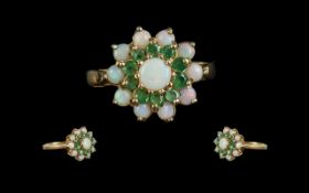 Ladies 9ct Gold Opal and Emerald Set Ring. Full Hallmark to Shank,. Flower head Design.