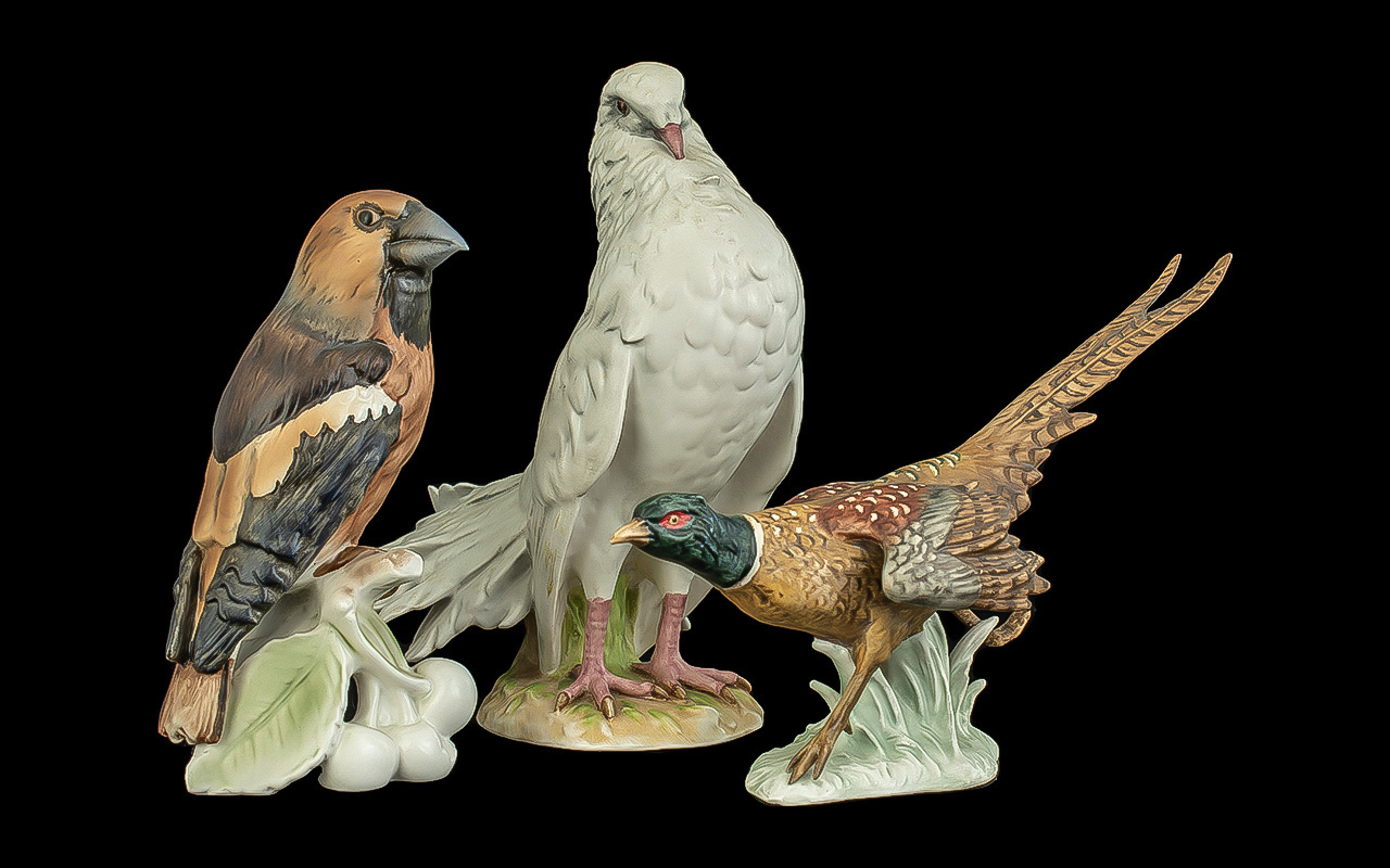 Three Goebel Bird Figures, comprising a Pheasant No CV120, 6" tall, Dove Pigeon 38155, 8" tall,