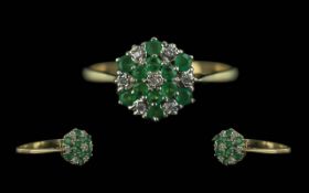 9ct Gold Emerald & Diamond Ring, flowerhead setting, weight 1.95 grams. Ring size R.