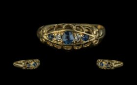 18ct Antique Sapphire & Diamond Ring, three sapphires set between two round diamonds,