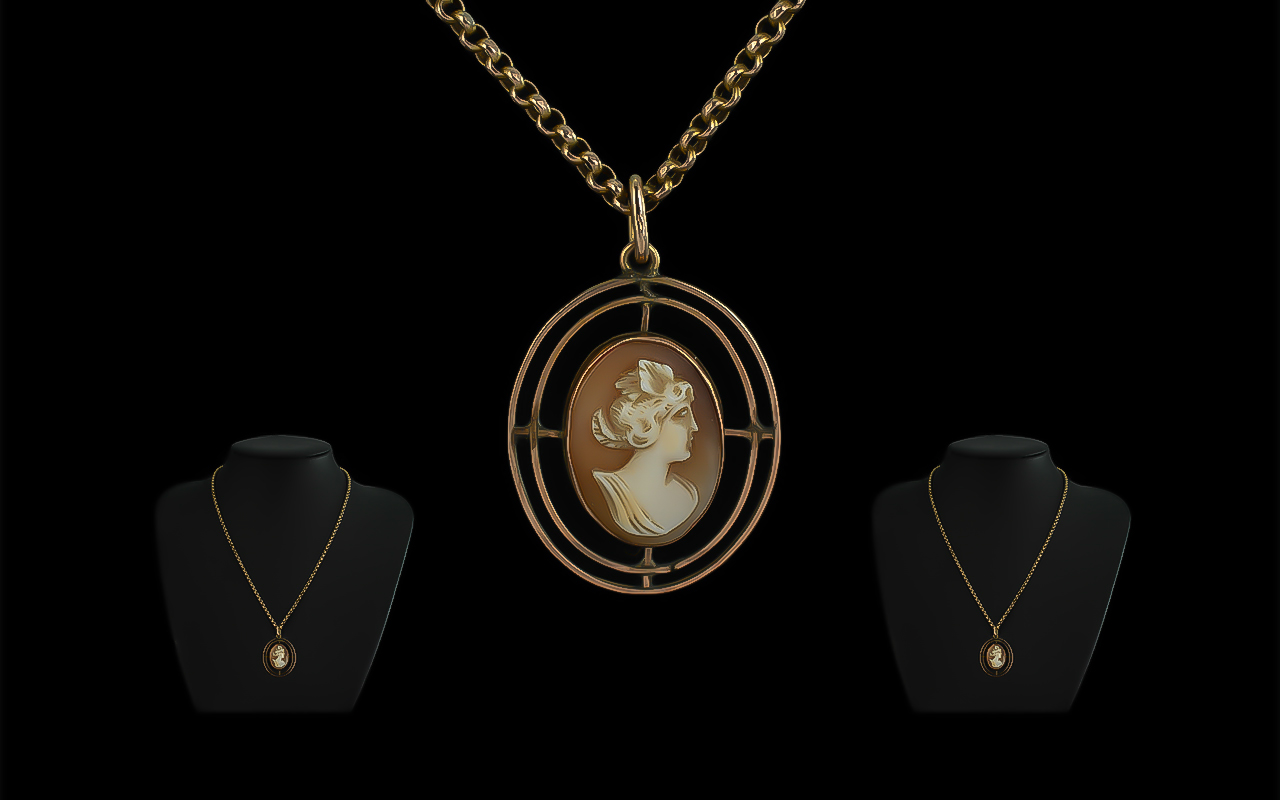 9ct Gold Cameo Pendant, central Cameo encircled by two oval gold rings, suspended on a box link