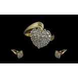 Ladies 18ct Gold Attractive Diamond Set Cluster Ring, marked 750-18ct to interior of shank.