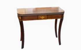 An Edwardian Mahogany Occasional Folding Table with inlaid marquetry decoration to the front.
