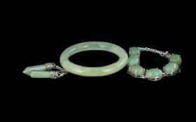 Jade Bangle, with matching bracelet and earrings.
