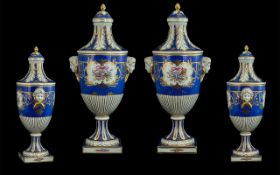 Dresden Superb Quality Pair of Large and Impressive Hand Painted Mask Handled Lidded Vases,