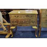 Chinese Gold Lacquered Chest of Drawers, raised on legs, one large above three smaller drawers,