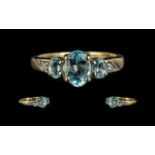 Ladies 9ct Gold Attractive 3 Stone Aquamarine Set Ring with Diamond Set Shoulders.