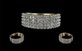 9ct Gold Diamond Cluster Ring, set with four rows of round brilliant cut diamonds,