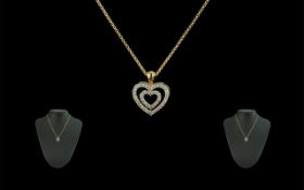 18ct Gold Double Heart Shaped Diamond Set Pendant - Attached to a 18ct Gold Chain.