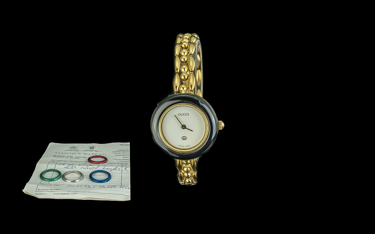 Gucci - Gold Plated Ladies Multi-Colour Interchangeable Bezels Wrist Watch. ( 6 ) In Total.