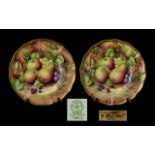 Two Handpainted Baroness Fruit Pattern Plates, 10.5" diameter with gilt trim.