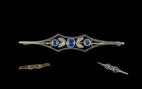 18ct Gold and Platinum Diamond & Sapphire Set Bar Brooch, with original display box.