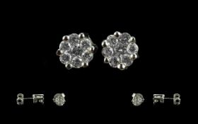 18ct White Gold - Attractive Pair of Diamond Set Stud Earrings - Cluster Design. Marked 18ct.