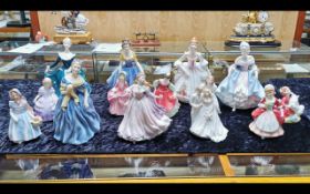 Collection of Porcelain Figures, to include Doulton and Worcester, 'Southern Belle', 'Melanie',