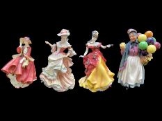 Four Royal Doulton Figures, comprising Balloon Seller, Belle Figure of the Year, Flowers of Love,