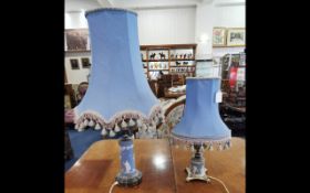 Two Wedgwood Table Lamps, classical scenes, silver plated bases and supports.