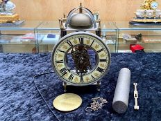 German Wall Clock, Roman numerals on ceramic rim decorated with flowers.