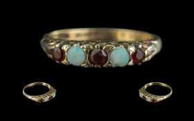 Ladies Attractive 9ct Gold Opal and Garnet Set Ring - Full Hallmark To Shank.