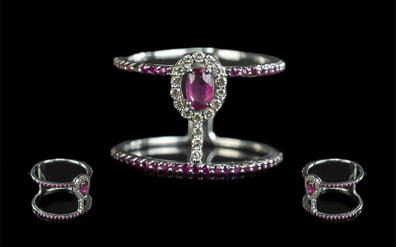 Ladies - 18ct White Gold Modern Fashion Rubies and Diamonds Set Ring of Unusual Form.
