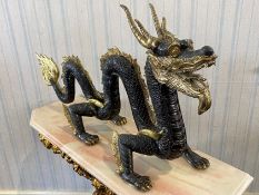 A Large Chinese Style Four Claw Bronze Dragon, brown textured body with gilt highlights. Height 60.