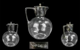 Small Silver Topped & Handled Water Jug, bulbous faceted form, hallmarked for Sheffield d 1896. 7.