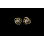 Pair of 9ct Gold Diamond Set Knot Earrings, centre of knot set with round cut diamond. Weight 2.