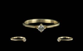 9ct Gold Diamond Solitaire Ring, set with a single round cut diamond, weight 1.15 grams.