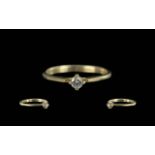 9ct Gold Diamond Solitaire Ring, set with a single round cut diamond, weight 1.15 grams.