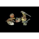 Collection of Bird Figurines, comprising Beswick Great Wagtail, Coalport Robin, two Coalport ducks,