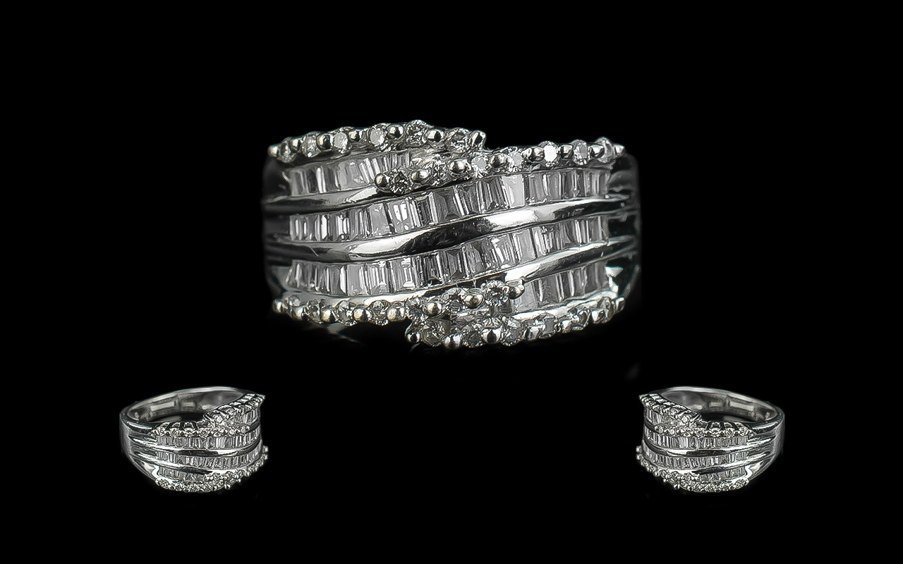 14ct White Gold - Good Quality Baguette and Brilliant Cut Diamond Set Dress Ring.