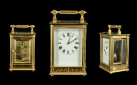 KJB - Gilt Brass Carriage Clock, 8 Day Striking, Lever Platform Movement, White Enamel Dial.