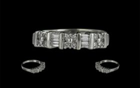 14ct White Gold Pleasing Quality Baguette and Brilliant Cut Diamonds Channel Set Ring. Marked 14ct