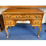 Yew Wood Ladies Desk, two large drawers over two smaller drawers. 38" wide x 20" deep x 30" high.