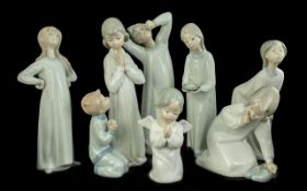 Collection of Lladro Figures, comprising four in perfect condition, Boy Yawning No.