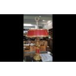 Brass Table Lamp, with red and gilt trim to base and matchine red and gilt shade.