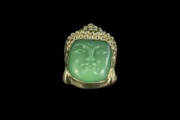 Jade Buddha Pendant, carved face with yellow metal surround, measures approx.