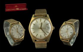 Omega - Automatic Gold on steel Gents Just / Date Manual Wind Wrist Watch, Model No 166-041.