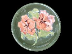 Moorcroft Plate, Signed to Base, measures 8.5'' diameter. Dark green base with peach coloured