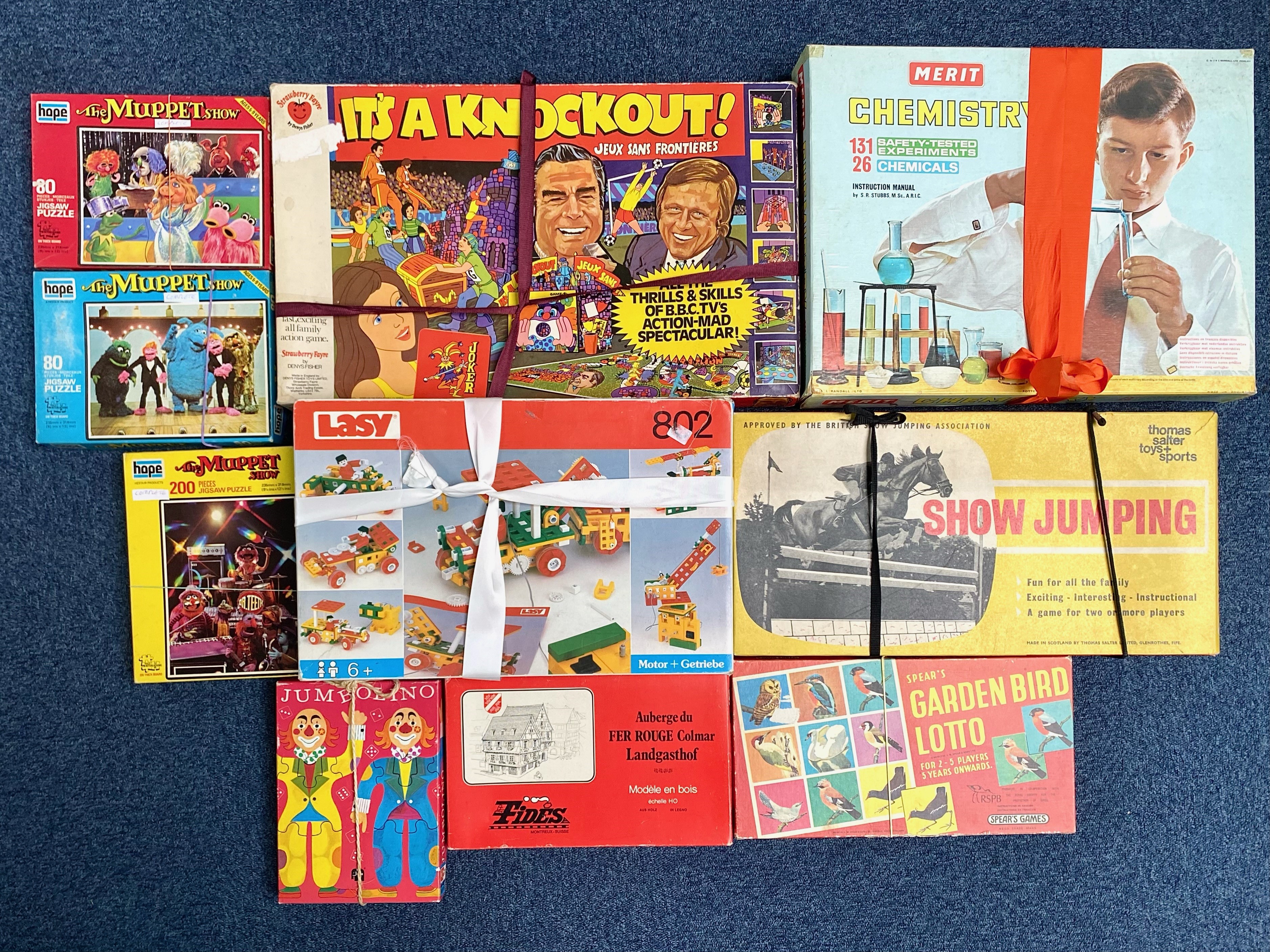Box of Vintage Games & Jigsaws, assorted including It's a Knockout, Muppet Jigsaws, Chemistry Set,