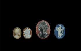 Four Unmounted Cameos, To Include A Wedgwood, Two Shell and a glass. The largest measuring 34 by