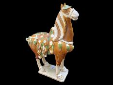 Ceramic Figure of a Standing Tang Style Chinese Horse, decorated with colourful saddle and bridle.