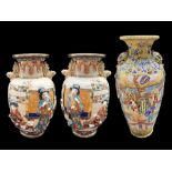Three Oriental Tall Vases, comprising a