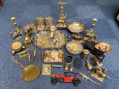 Quantity of Brass & Plated Ware, including horse and rider, doorstop, trivets, candlesticks,