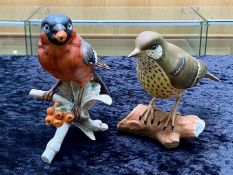 Two Porcelain Bird Figures, comprising a Spode Mistle Thrush, 6'' tall and a Goebel Bullfinch 6''