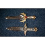 Two Heavy Good Quality Oriental Fanatasy Decorative Display Daggers, with dragon decoration to