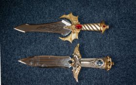 Two Heavy Good Quality Oriental Fanatasy Decorative Display Daggers, with dragon decoration to