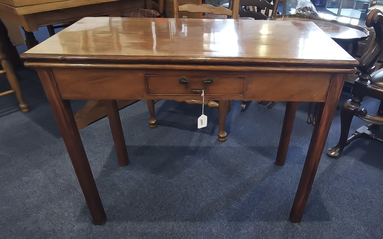 Georgian Mahogany Tea Table, fold over top, single drawer. Raised on square legs. Measures 29'' x