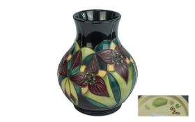 Moorcroft Modern Tube lined Globular Shaped Vase, Stylised Floral Design. Date 2000, Designer K.W.