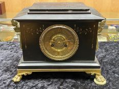 Victorian Black Marble Mantle Clock, brass dial with Arabic numerals, mounted on four claw brass